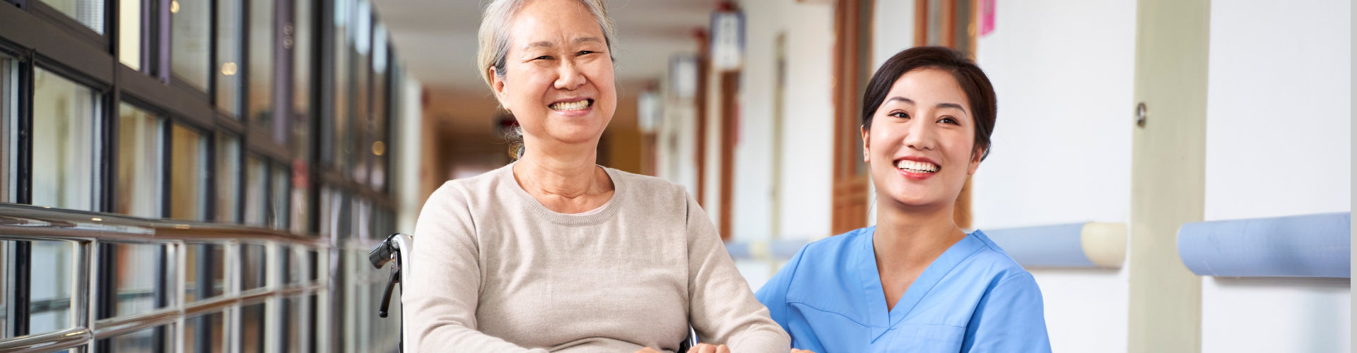 asian senior woman and her caregiver